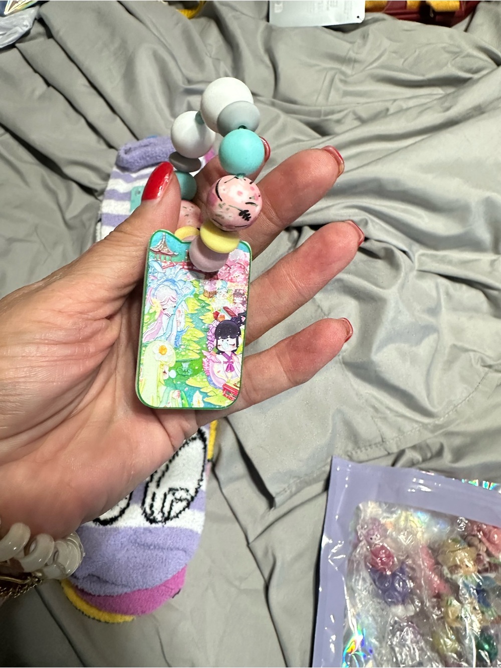 Anime beaded bag charm